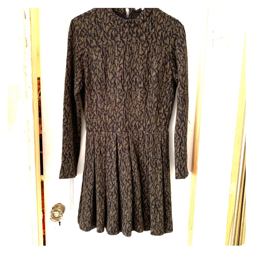 a beautiful peplum dress from Opening Ceremony